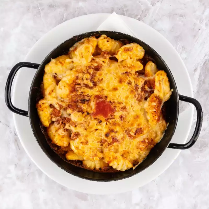 Njoki bolognese – gratinirani v krušni peči